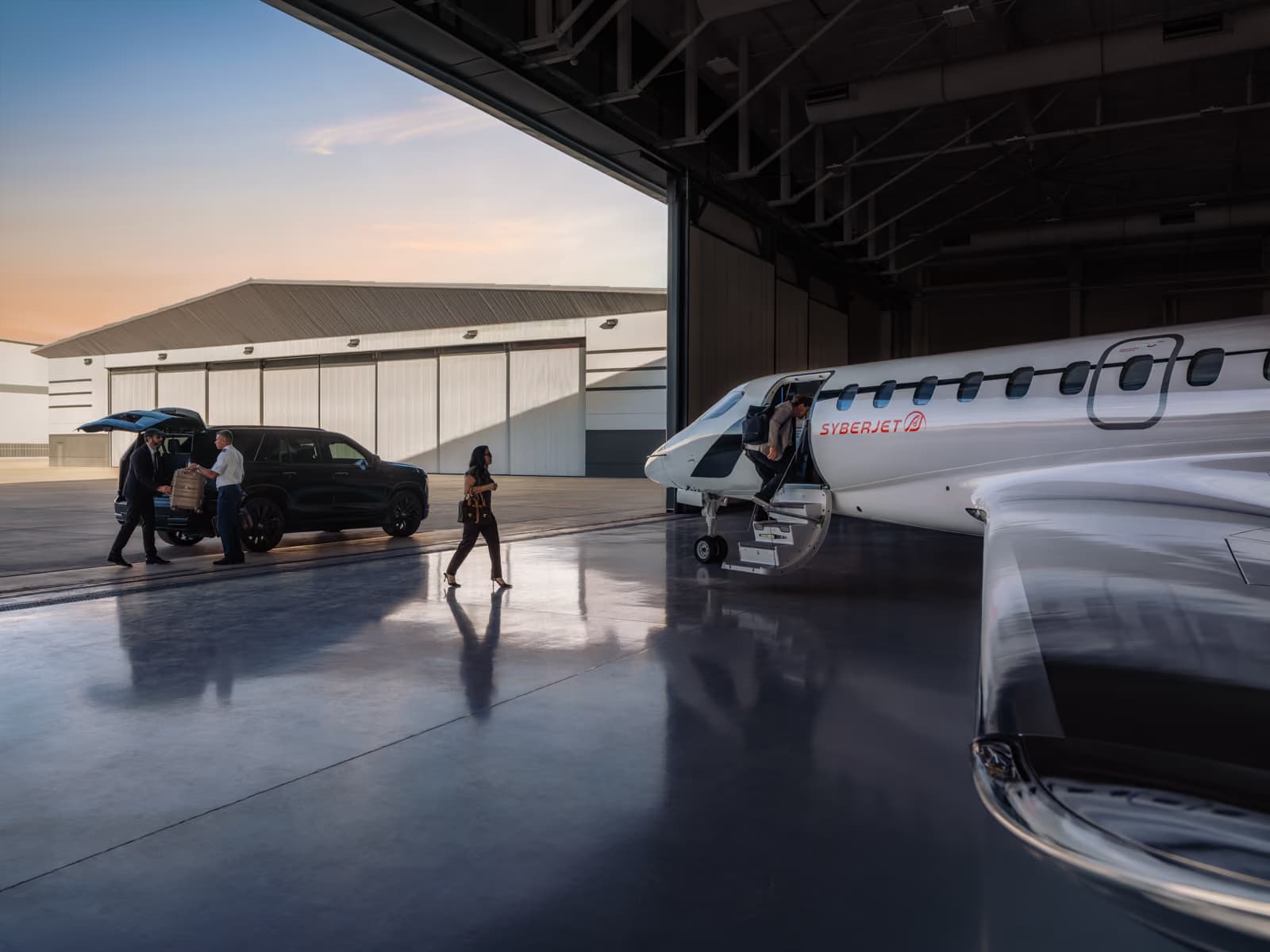 Passengers boarding the SJ36 in a hangar