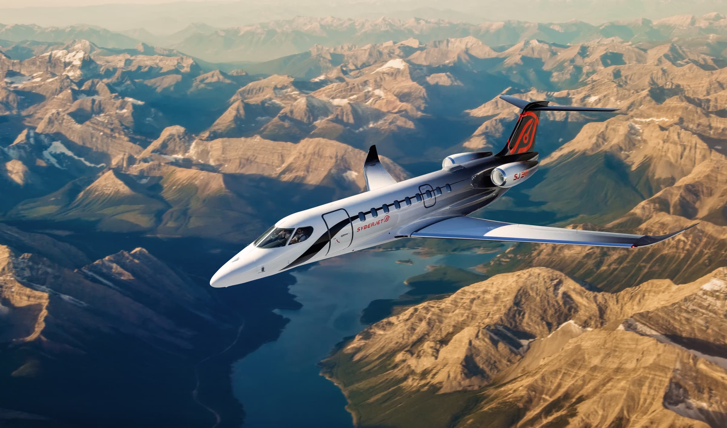 SJ36 in flight over mountains